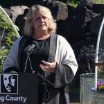 Kent Mayor Dana Ralph speaks at the King County executive press conference Aug. 27 at the Paradise Parking Plots Community Garden. STEVE HUNTER, Kent Reporter