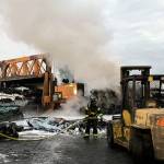 Crews extinguish fire at Kent wrecking yard