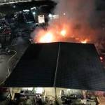 Fire burns at a Kent wrecking yard on Tuesday, Sept 1. COURTESY PHOTO, Valley Regional Fire