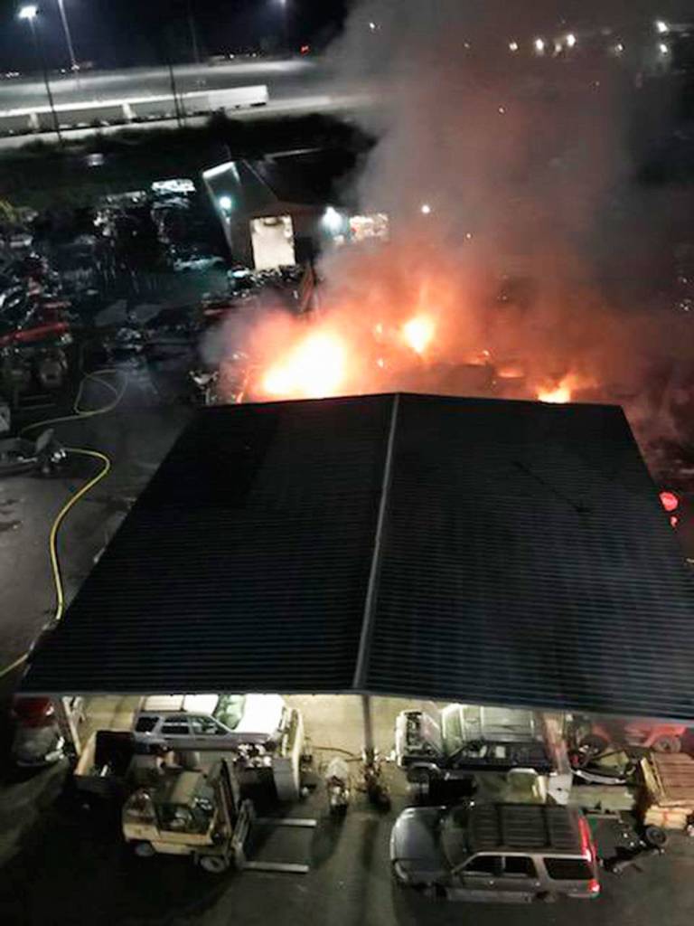Fire burns at a Kent wrecking yard on Tuesday, Sept 1. COURTESY PHOTO, Valley Regional Fire