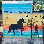 Whimsical silhouettes of animals and people appear on Melissa Kochs box, Pursuit of Happiness, at State Route 99 (Pacific Highway South) and South 252nd Street. COURTESY PHOTO, City of Kent