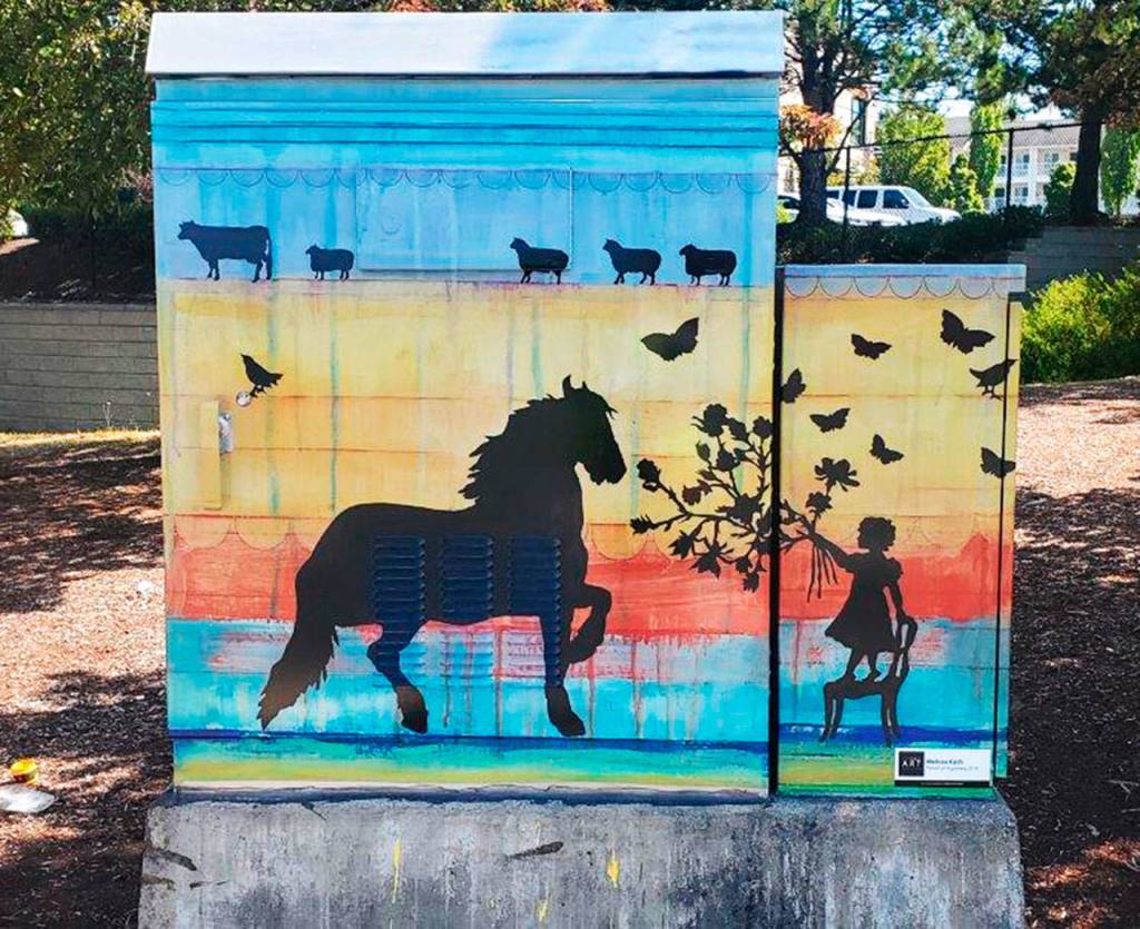 Whimsical silhouettes of animals and people appear on Melissa Kochs box, Pursuit of Happiness, at State Route 99 (Pacific Highway South) and South 252nd Street. COURTESY PHOTO, City of Kent