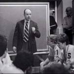 Ed Pepple discusses strategy with his squad. Photo courtesy of the Mercer Island School District