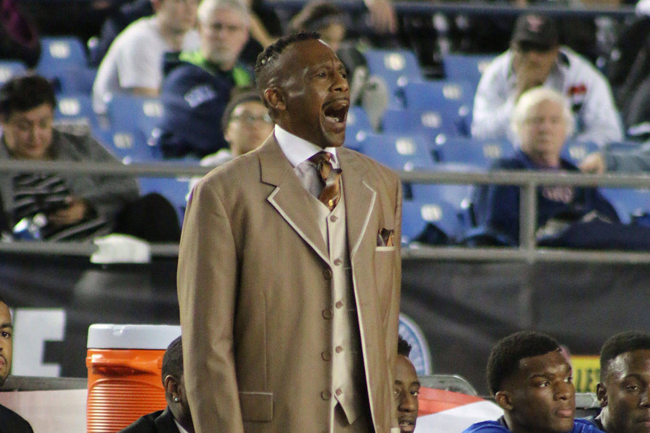 Mirror file photo Jerome Collins, shown coaching the Federal Way High School boys basketball team in a 2016 state tournament semifinal game.