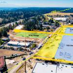 COURTESY PHOTO, City of Kent                                A drone photo with a dotted yellow line (looking south) drawn in shows where Sound Transits light rail will go along the West Hill in Kent. The three streets in orange will be new streets, with the Kent Des Moines Station right near South 236th Street and a parking garage east of it. The TOD (transit-oriented development) sites will be marketed by the city for residential and retail developments.