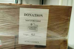 Donations of chicken by Foster Farms arrive Sept. 30 at the Northwest Harvest warehouse in Kent. COURTESY PHOTO, Foster Farms