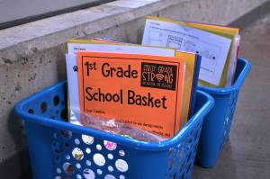 Supplies is prepped and ready for pick-up at Lakeland Elementary on Sept. 3, to help families adjust to remote learning. Olivia Sullivan/the Mirror