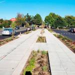 A look at the recently completed Meet Me on Meeker sidewalk upgrades looking east in front of the Riverbend Driving Range on West Meeker Street in Kent. The sidewalk project will be extended under a contract awarded Oct. 6 by the City Council another 750 feet on the south side of the street to the Midtown 64 Apartments. COURTESY PHOTO, City of Kent
