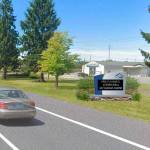 A photo simulation traveling westbound on Willis Street near the new roundabout of the new message boards the city of Kent will install. COURTESY IMAGE, City of Kent