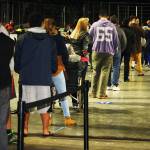 People line up to get ballots at the Vote Center Tuesday, Nov. 3 inside the accesso ShoWare Center. STEVE HUNTER, Kent Reporter