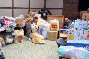 There were lots of donations to sort from the Kent Police blanket and pillow drive for children. COURTESY PHOTO, Kent Police