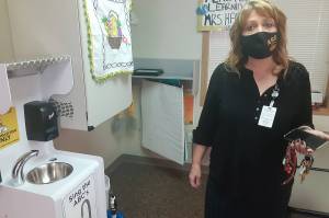 Cindi Blansfield, Auburn School Districts Associate Superintendent for Business and Operations, describes measures the school district has taken to ensure the safety of students and teachers before schools began hybrid learning Wednesday, March 3. ROBERT WHALE, Auburn Reporter.