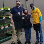 Kent East Hill Fred Meyer employees Bryan Gilderoy, Jennifer Torrence and Lindsay Young are seeking a hazardous pay hike measure from the Kent City Council. COURTESY PHOTO