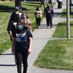Friends and relatives of Giovonn Joseph-McDade begin to arrive for a press conference April 14 at Canterbury Park in Kent. STEVE HUNTER, Kent Reporter
