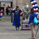 A Kent-Meridian High School graduate at the 2020 ceremony at the schools campus. Similar drive-thru ceremonies are planned for this year in the Kent School District. FILE PHOTO, Kent Reporter