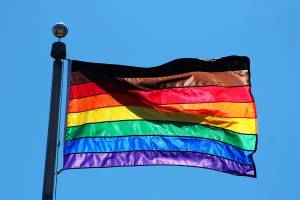 A Pride flag flies above Federal Way City Hall this month. In addition to the traditional six colors, the flag also includes a black stripe for diversity and a brown stripe for inclusivity. Kent city leaders will raise a Pride flag at City Hall on June 14. OLIVIA SULLIVAN, Sound Publishing