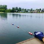 A city of Kent Parks Department employee marks off the swim area at Lake Meridian Park. COURTESY PHOTO, City of Kent