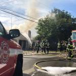 Firefighters respond Aug. 18 to a house fire in the 600 block of Prospect Avenue North in Kent. COURTESY PHOTO, Puget Sound Fire