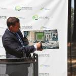 Jason Fiorito shows a rendering of the new buildings during Pacific Raceways groundbreaking event on Wednesday, Aug. 18, 2021. Photo by Henry Stewart-Wood/Sound Publishing