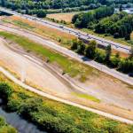 A photo from a drone of the Downey Farmstead Restoration project looking south in late summer 2021. The future fish habitat channel and flood storage area is between the Green River and State Route 516. COURTESY PHOTO, City of Kent