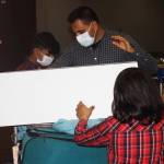 The Azizulla Jabarkhail family loads up luggage Oct. 1 at Sea-Tac Airport to head home to Kent. STEVE HUNTER, Kent Reporter