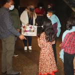 It was a welcome home gathering Oct. 1 at Sea-Tac Airport for Azizulla Jabarkhails children and wife after they were finally able to evacuate Afghanistan, a month after U.S. troops left the country. STEVE HUNTER, Kent Reporter