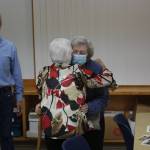 CAMERON SHEPPARD, Sound Publishing
Joan Nelson welcomes Mary Loop with a hug at the Kent High School Class of 1946 reunion Oct. 13 at the Kent Senior Center. Loop helped to found Kent Youth and Family Services.