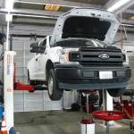 A city of Kent Public Works pickup in for service at the city maintenance shop. The city plans to buy about 28 pickups in 2022 to replace aging trucks. COURTESY PHOTO, City of Kent