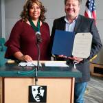 Carmen Goers, left, receives a Martin Luther King Medal of Distinguished Service award from King County Councilmember Reagan Dunn. COURTESY PHOTO, King County