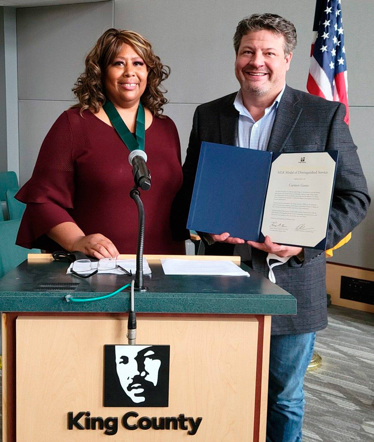 Carmen Goers, left, receives a Martin Luther King Medal of Distinguished Service award from King County Councilmember Reagan Dunn. COURTESY PHOTO, King County