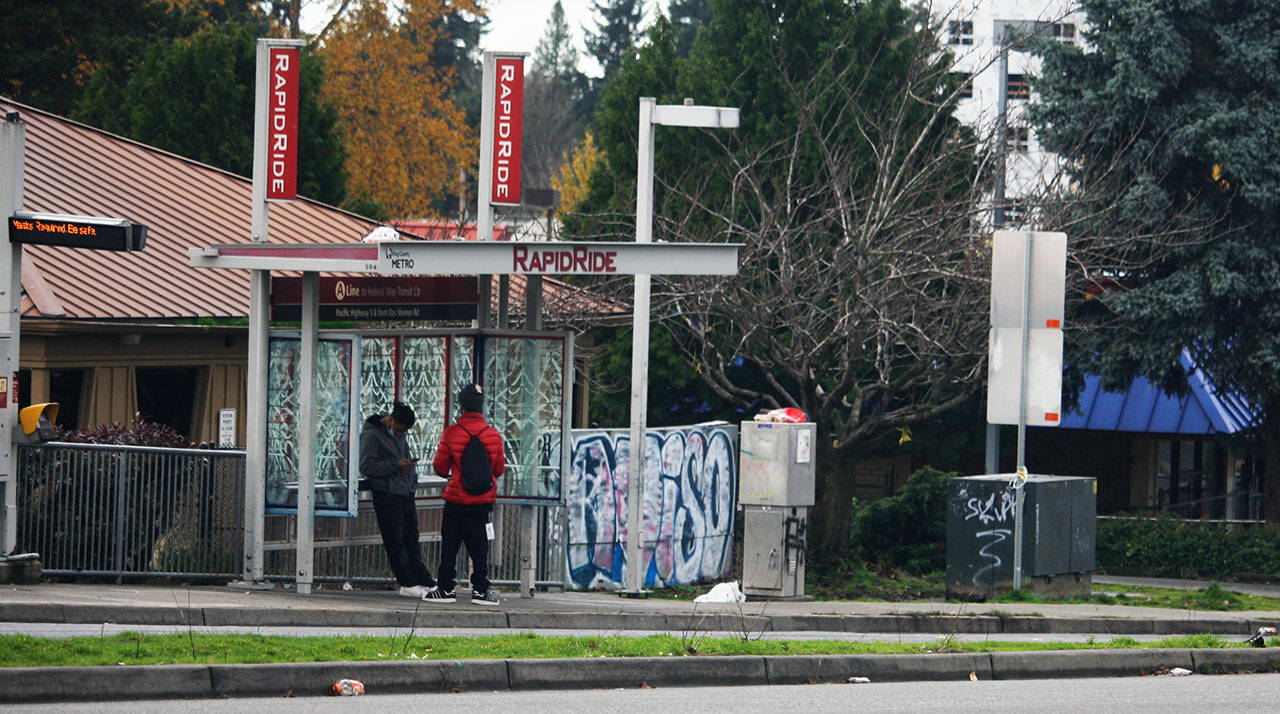 Three shootings in four days occurred Nov. 24-27 near this bus stop along Pacific Highway South near Kent Des Moines Road in Kent. One man died and five were injured, according to Kent Police reports. STEVE HUNTER, Kent Reporter