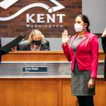 City clerk Kim Komoto swears in City Council members Satwinder Kaur and Toni Troutner, far right, at the Jan. 4 council meeting. COURTESY PHOTO, City of Kent