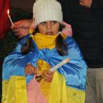 A girl wears the colors of the Ukrainian flag. STEVE HUNTER, Kent Reporter