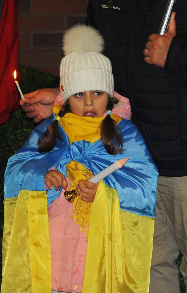 A girl wears the colors of the Ukrainian flag. STEVE HUNTER, Kent Reporter