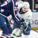 Seattles Sam Oremba, right, battles for the puck against Tri Citys Alex Serraglio during a March 6 game at the accesso ShoWare Center in Kent. COURTESY PHOTO, Brian Liesse, Seattle Thunderbirds