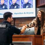 Kent City Councilmember Zandria Michaud congratulates Officer Ozzy Arjona after his swearing in. COURTESY PHOTO, City of Kent
