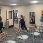 That's no ordinary mirror on the wall in the Cadence at Kent-Meridian fitness studio. It's a high-tech fitness mirror where residents of the retirement community can connect to live workouts and on-demand classes while exercising alongside friends and family around the world!