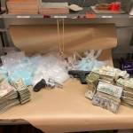 Auburn Police Department reports it seized 82,400 fentanyl pills, 1.8 pounds of heroin, 3.8 pounds of methamphetamine, $173,138 in U.S. currency and two firearms from a Kent apartment on the afternoon of April 20 and arrested its 32-year-old tenant. COURTESY PHOTO