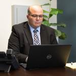 Christian Pearson, attorney at Iddins Law Group in Kent. Call 253-854-1244 or visit iddinslaw.com to request a complimentary phone consultation. Charles Cotugno Photo.