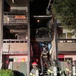 Firefighters battle a blaze June 20 at the Atrium on James Street Apartments in the 24000 block of 64th Avenue South. COURTESY PHOTO, Puget Sound Fire