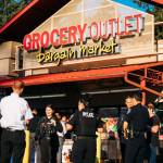 Members of Puget Sound Fire, Kent Police and Federal Way Police gather June 30 for a Battle of the Badge food fundraiser at Grocery Outlet in Federal Way. COURTESY PHOTO, Kent Police