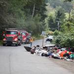 County workers cleaned trash and debris from homeless encampments and illegal dumping along the Green River Road July 13 in unincorporated King County. HENRY STEWART-WOOD, Sound Publishing