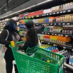 A customer shops at Amazon Fresh on opening day. Olivia Sullivan/the Mirror
