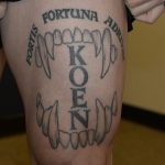 Photo of Nelsons thigh shows a tattoo of Jeff Nelsons Auburn Police K9s name Koen set in between canine teeth and a Latin phrase which translates to fortune favors the bold. These photos were taken by the FBI after Nelson was charged with murder. Courtesy photo