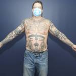 Unredacted photo of Jeff Nelsons tattoos recently released by Judge Nicole Gaines Phelps. Nelson has a quote by Fascist dictator Benito Mussolini just under his neckline. These photos were taken by the FBI after Nelson was charged with murder. Courtesy photo