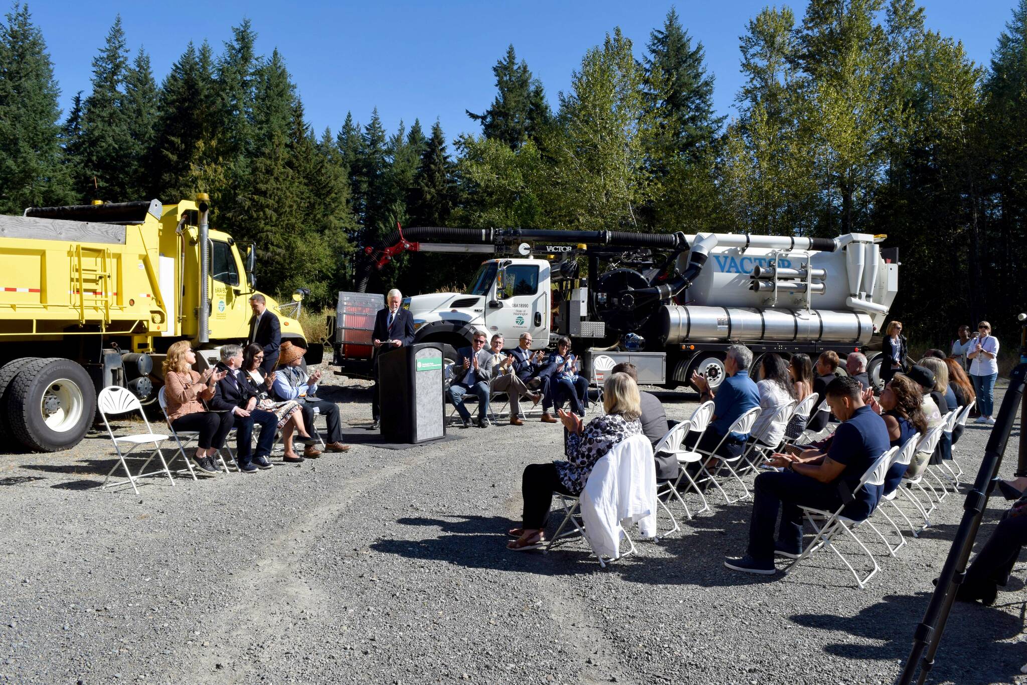 A crowd of officials watches a ceremony on I-90/State Route 18 interchange project. Photo by Conor Wilson/Valley Record