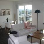 A living room at one of the Madison Plaza Apartments. STEVE HUNTER, Kent Reporter