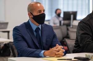 One of two Federal Way police officers who fatally shot Robert Lightfeather in 2017, Austin Rogers, listens during the inquest into the shooting at the Patricia H. Clark Children and Family Justice Center on Monday, Sept. 26. (Kylie Cooper / The Seattle Times)