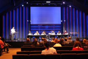 Moderator Pat Hanis (left) asked the six candidates  (from left to right) Bill Boyce, Claudia Kauffman, Debra Entenman, Kyle Lyebyedyev, Shukri Olow and Chris Stearns  hot topic questions on voters minds during a Oct. 3 forum at Real Life Church in Covington. Photo by Bailey Jo Josie/Sound Publishing.