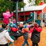 Students from Springbrook Elementary School check out the new play equipment at Chestnut Ridge Park in Kent. COURTESY PHOTO, City of Kent